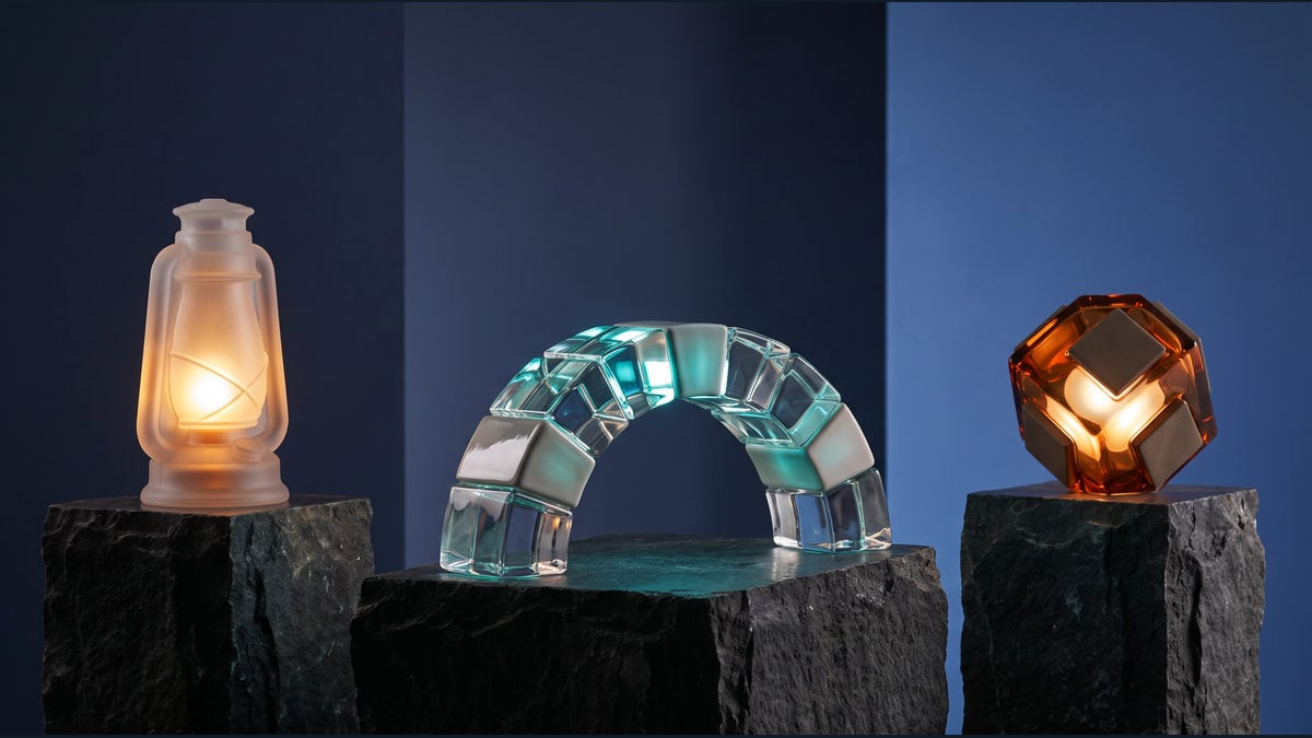 A sign-in lantern, transparent relay bridge, and compact local engine cube stand on separate stone islands.