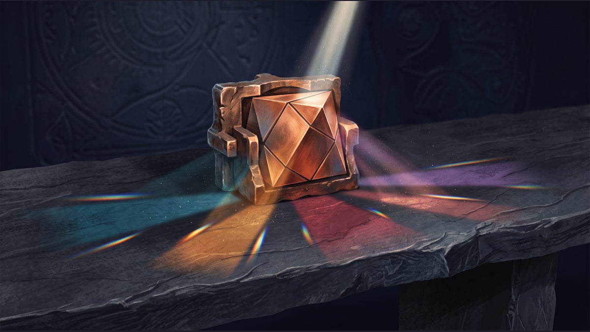 A faceted copper object casts coloured light across a dark slate bench.